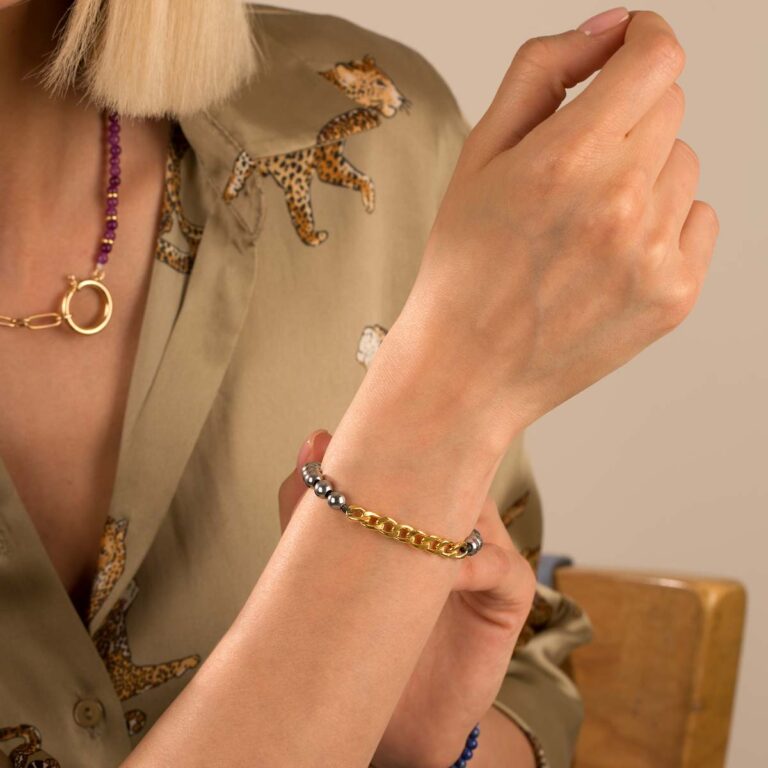 دستبند طلا سنگی نه حلقه کارتیه و حدید روشن