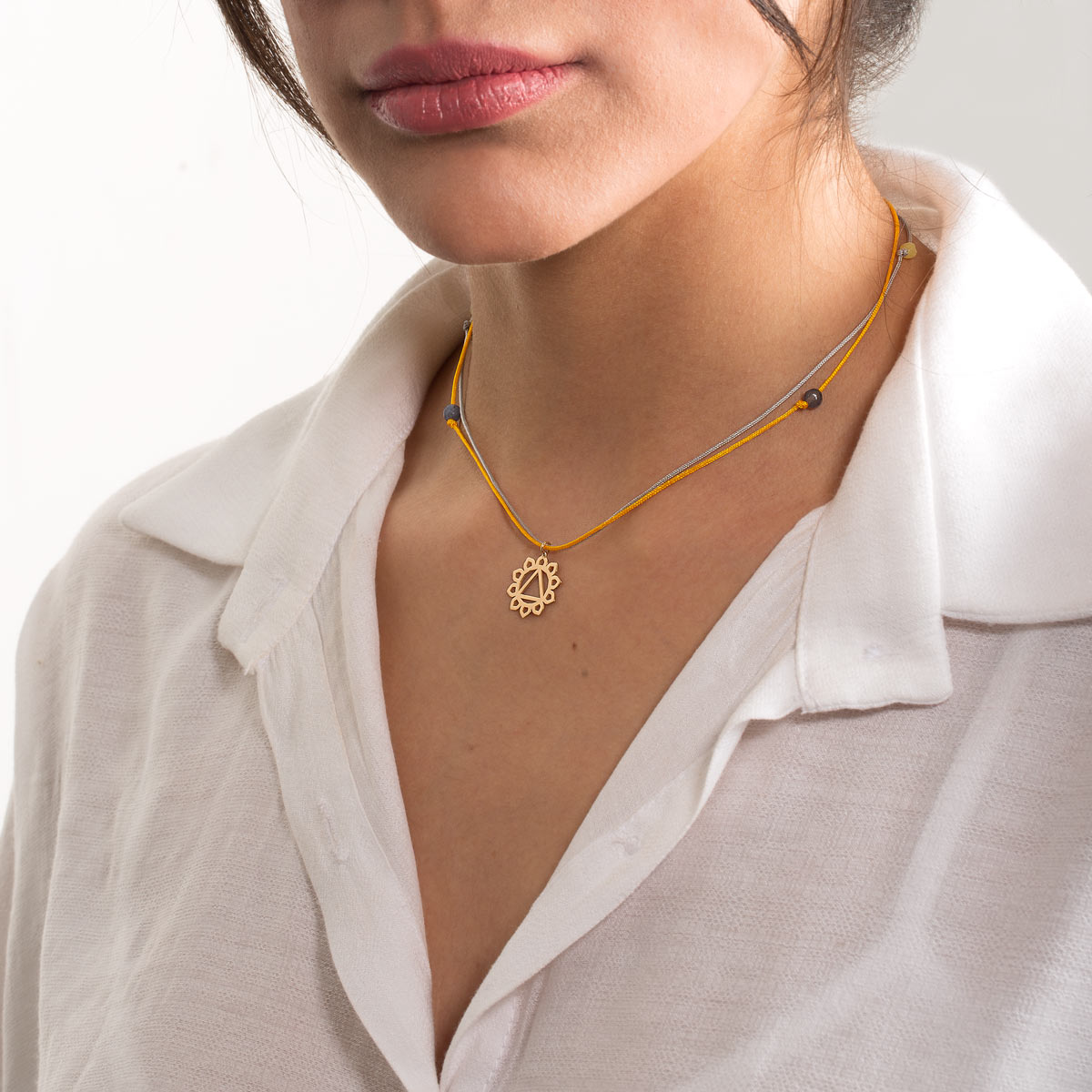 Sun chakra gold necklace in