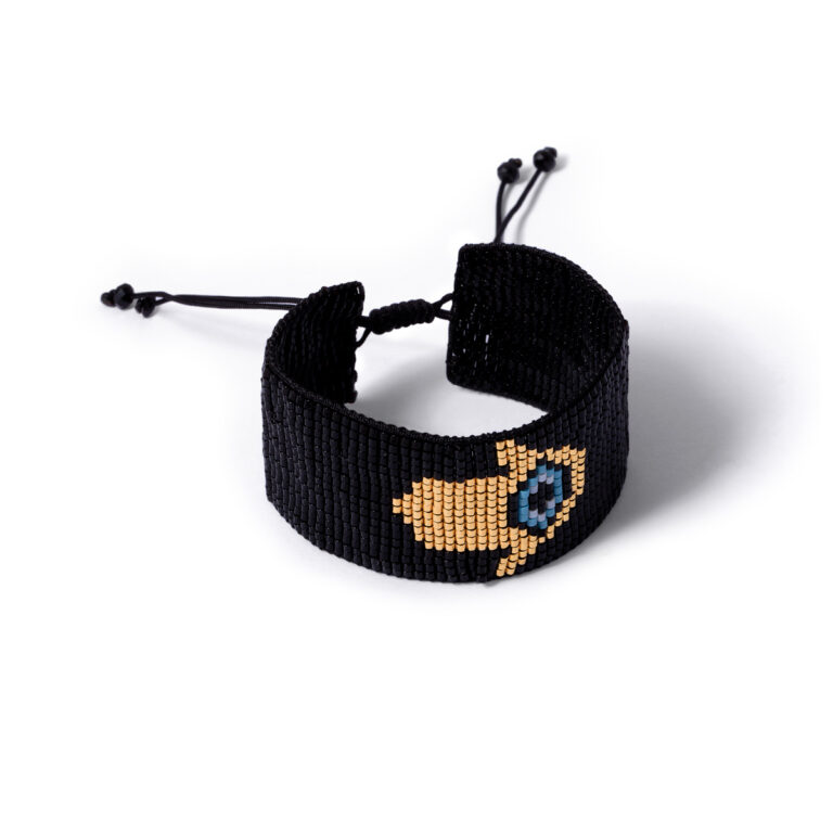 Gold bracelet woven with beads by the same hand (2)