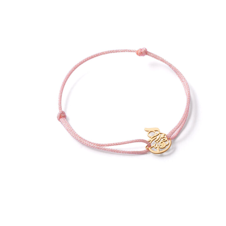 Your woven gold bracelet and nothing else