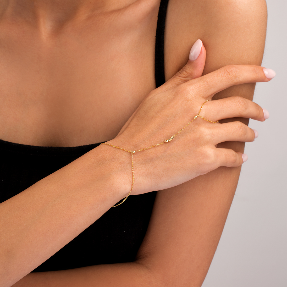 دستبند طلا زنجیری تمیمه پنج گوی گالری پرسته